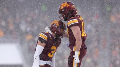 Gophers beat Wisconsin in snow for fourth Axe win in five years