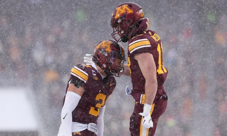 Gophers beat Wisconsin in snow for fourth Axe win in five years