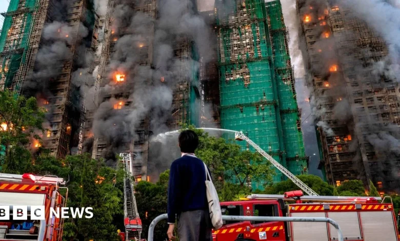 'Hang in there': Agonising wait for hundreds missing after Hong Kong blaze