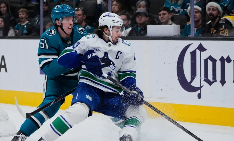 Officiating, power-play woes undo Canucks in loss to Sharks