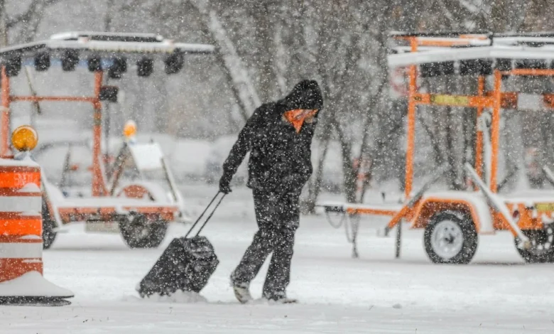 Winter storm wallops parts of Midwest on one of the biggest travel days of the year