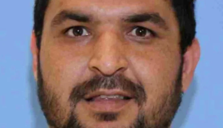 Accused National Guard shooter pleads not guilty to murder and assault charges at first court appearance from the hospital