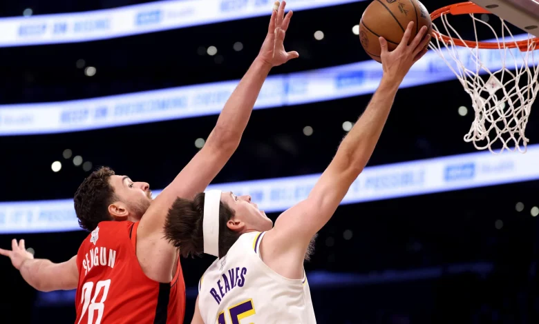 Austin Reaves will miss at least a month with calf injury