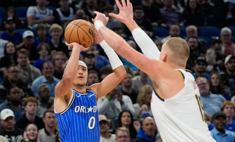 Black scores career-high 38, Magic overcome Nuggets for win