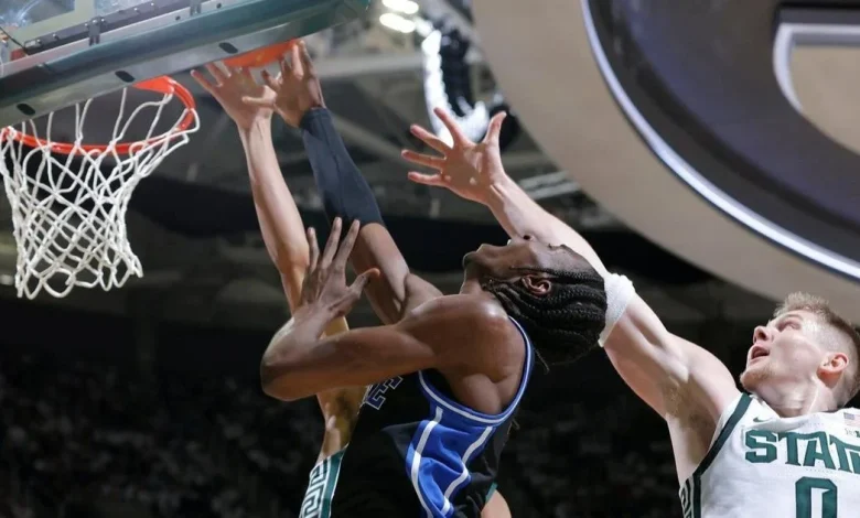 Cameron Boozer scores 18 in No. 4 Duke’s 66-60 win over No. 7 Michigan State