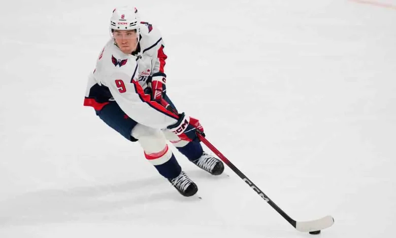 Capitals' Ryan Leonard exits vs. Ducks after hit from Trouba