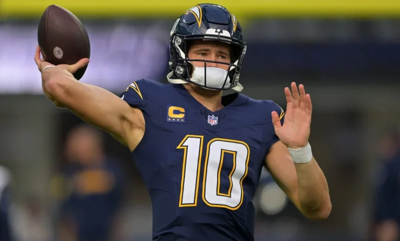 Chargers’ Justin Herbert suffers broken bone in left hand, hopes to play vs. Eagles