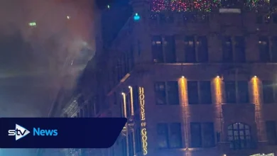 City road closed in both directions due to ongoing building fire