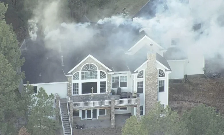 Colorado firefighters rush to put out garage fire that spread to home in Franktown