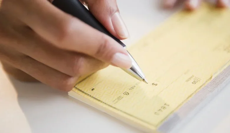 Could paper checks be on the way out, like the penny?