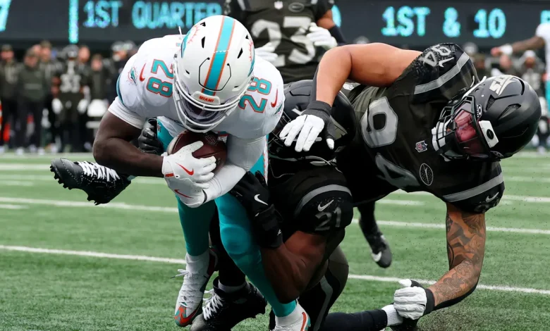 De'Von Achane injured in first half vs. New York Jets, what we know