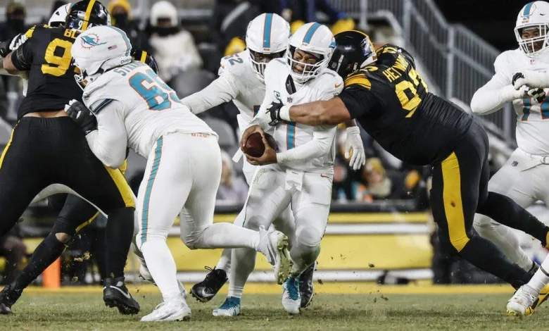 Dolphins’ Tua Tagovailoa reacts to losing starting job