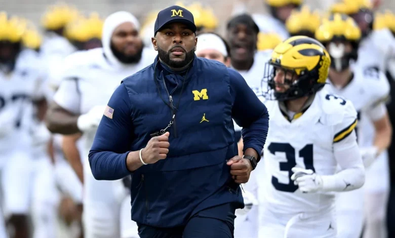 Ex-Michigan coach Sherrone Moore charged with home invasion, stalking, breaking and entering