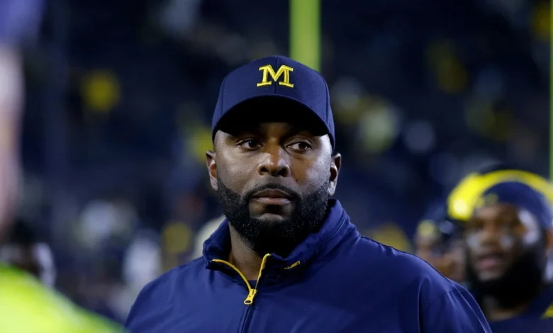 Ex-Michigan football coach Sherrone Moore charged with home invasion : NPR