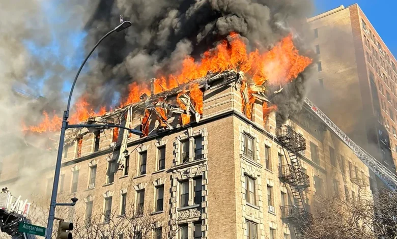 Fire rages at Upper West Side building, raining debris onto sidewalk