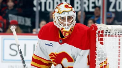 Flames’ all-California goalie tandem battled the elements to make history