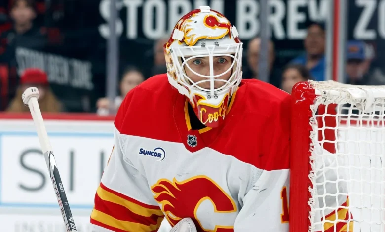 Flames’ all-California goalie tandem battled the elements to make history