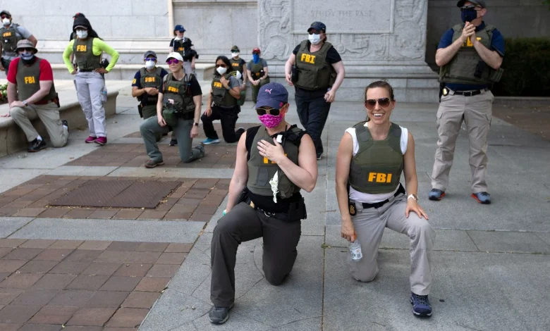 Former FBI agents sue agency for firings over kneeling over George Floyd