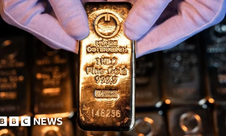 Gold and silver hit records as investors hunt for safety