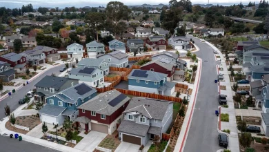 Home prices are poised to dip in 22 U.S. cities next year, a new analysis says. See where.