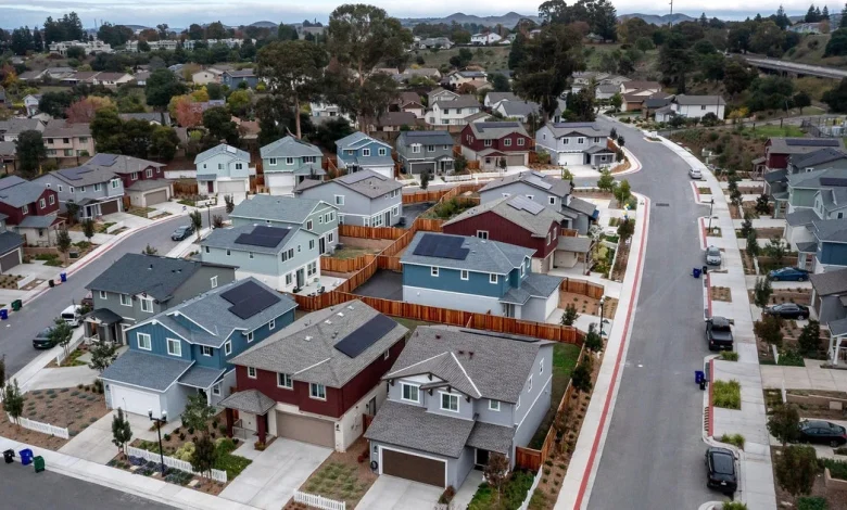 Home prices are poised to dip in 22 U.S. cities next year, a new analysis says. See where.