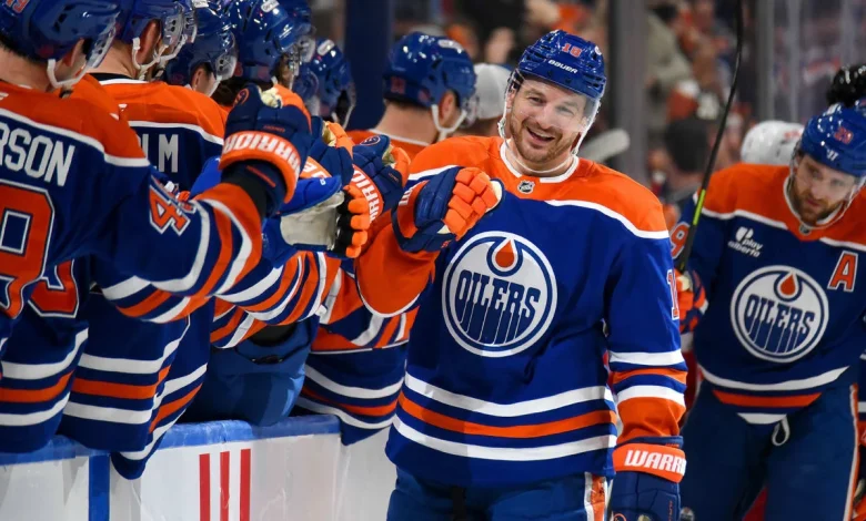 Hyman scores hat trick for Oilers in win against Red Wings