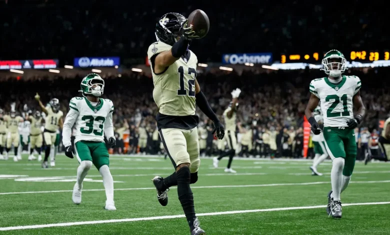 Is Chris Olave playing today for Saints vs. Titans?