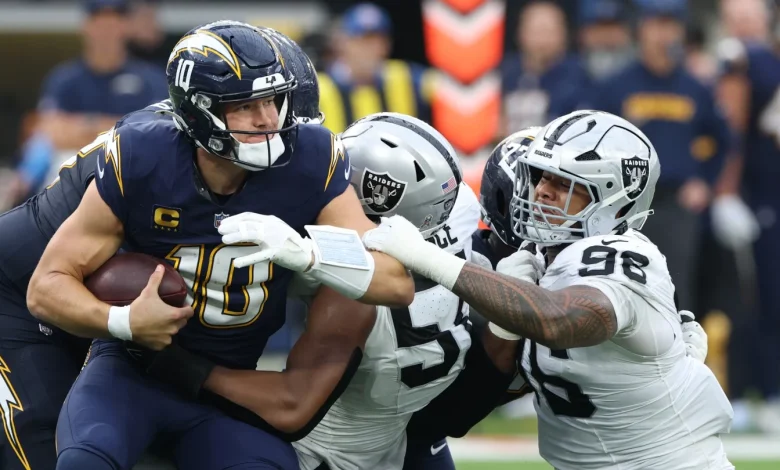 Justin Herbert underwent surgery on his left hand Monday