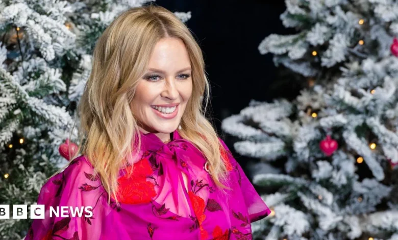 Kylie leads three-way race for Christmas number one