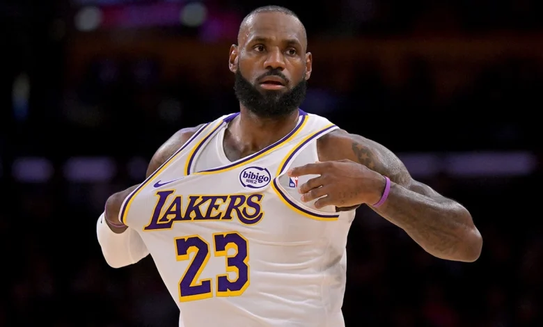 LeBron James accused of working on his 'golf swing' during national anthem