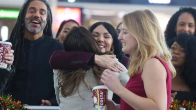Love Actually star surprises airport arrivals as she recreates iconic movie scene