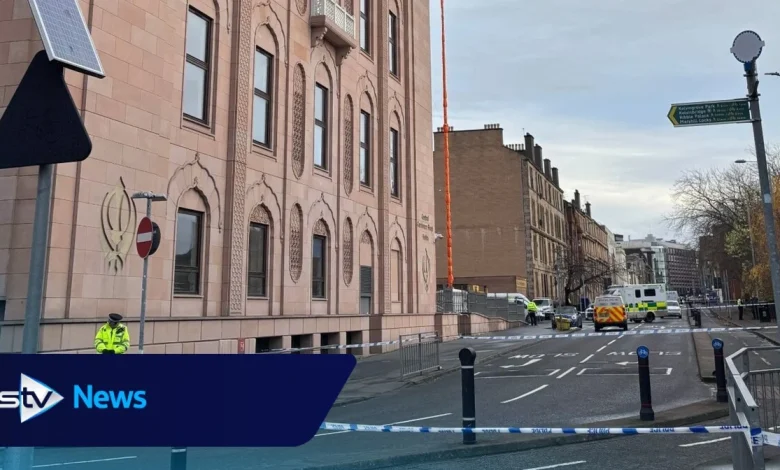 Man dead and three in hospital as police cordon off street after disturbance