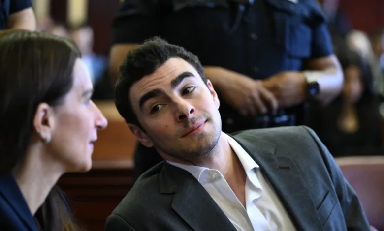 Mangione didn't want to talk. Police kept asking questions : NPR