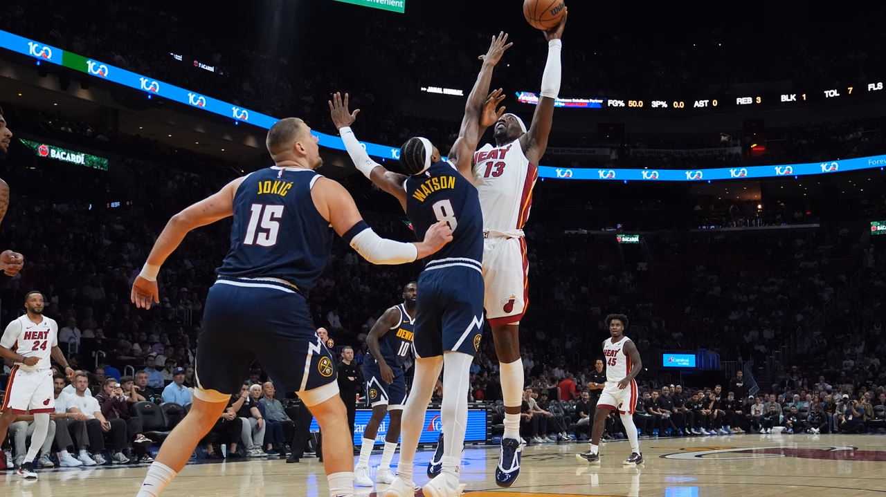 Nuggets star Nikola Jokic hurts left knee, limps off court at halftime in Miami