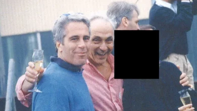 OSU alumni hold photos of billionaire Les Wexner with Jeffrey Epstein while demanding testimony