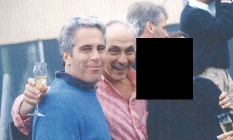 OSU alumni hold photos of billionaire Les Wexner with Jeffrey Epstein while demanding testimony