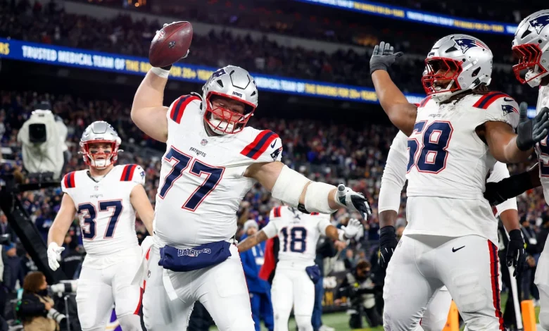 Patriots beat Ravens to clinch playoff berth