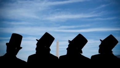 Photos show mock funeral for the penny at Lincoln Memorial