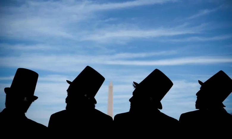 Photos show mock funeral for the penny at Lincoln Memorial