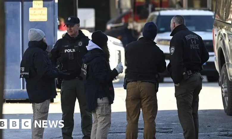 Police identify person of interest in Brown University shooting, sources say