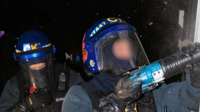 Police storm restaurant and homes at dawn with two businessmen arrested after 'pizza box' tips