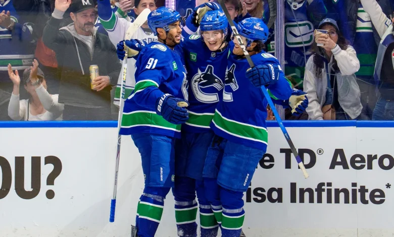 Raty has 1st 3-point game in NHL, Canucks defeat Wild to end 4-game skid