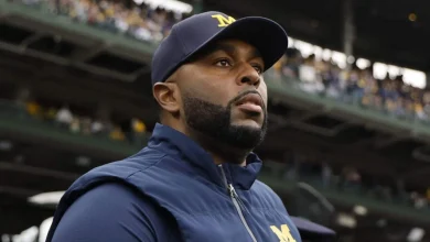 Sherrone Moore had ‘long history of domestic violence’ against Michigan staffer, lawyer alleges