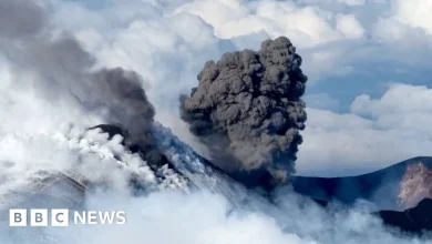 Snow-capped Mount Etna erupts as skiers glide down slopes