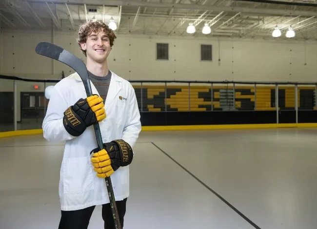 Student found community, and a future in research through hockey and science