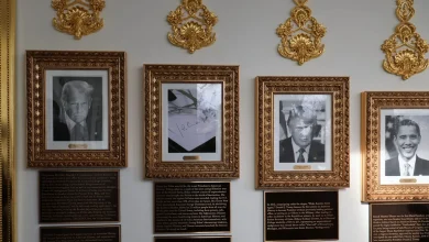 Trump disparages presidential foes in plaques attached to White House