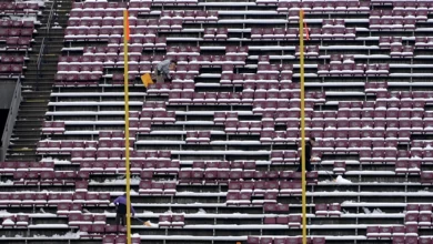 UM shoveling Washington-Grizzly Stadium to prepare for playoff game