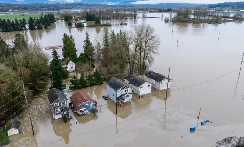 Washington state contends with devastating flooding as Midwest braces for arctic blast