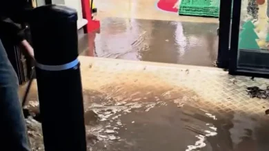 Water gushes into Co-op as staff battle to stop flood