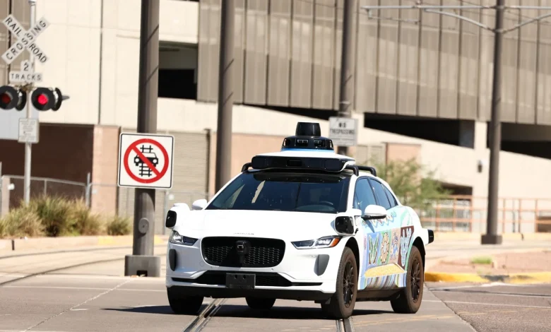 Waymo updating software after self-driving cars passed stopped school buses : NPR